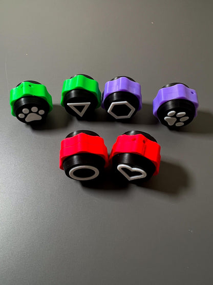 Squid Clickz Symbol Fidget Toy Set  Gonggi-Style Clickers for ADHD, Anxiety & Focus  Paw, Heart, Shapes  3D Printed Sensory Toys/Keychain