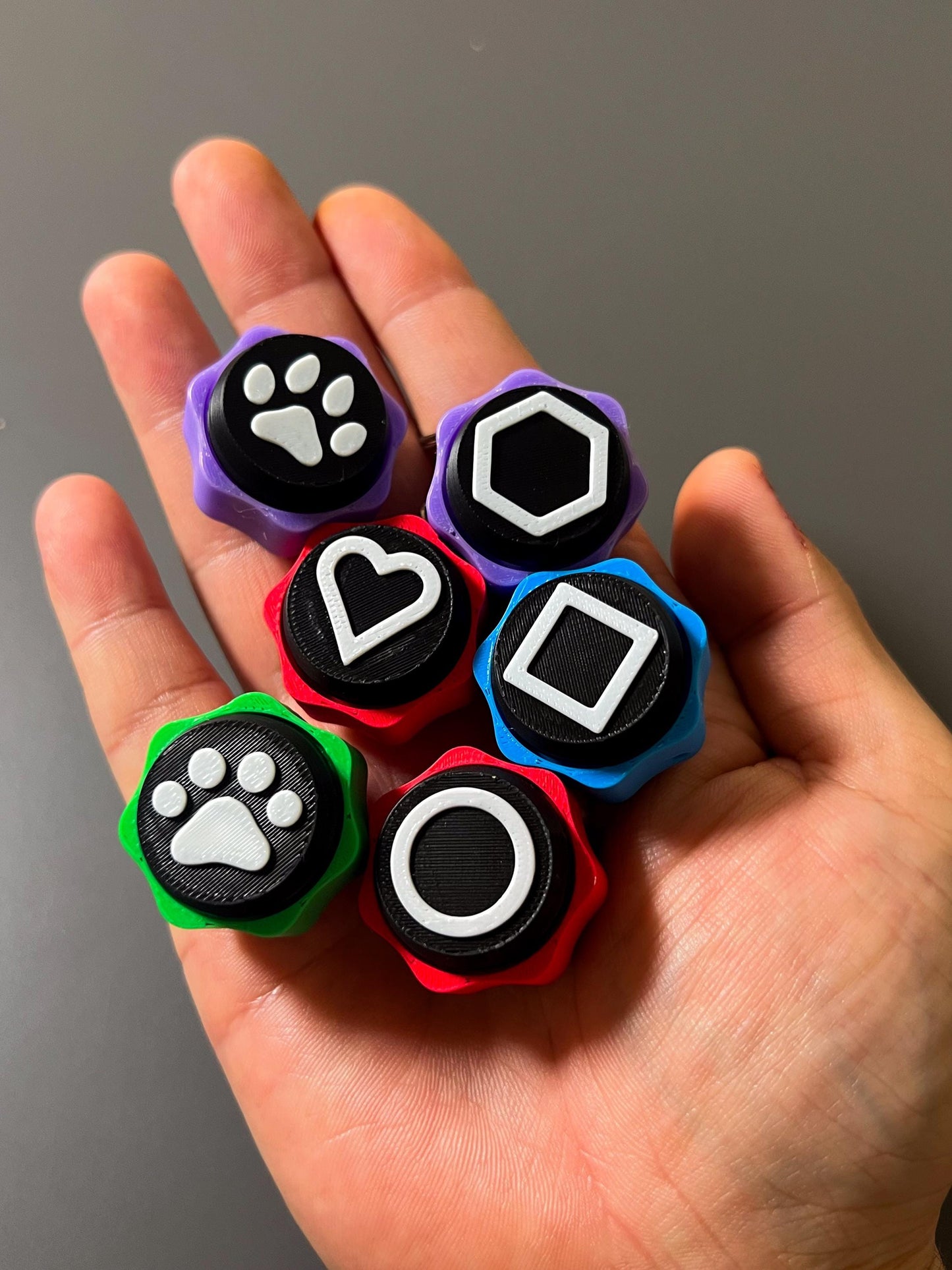 Squid Clickz Symbol Fidget Toy Set  Gonggi-Style Clickers for ADHD, Anxiety & Focus  Paw, Heart, Shapes  3D Printed Sensory Toys/Keychain